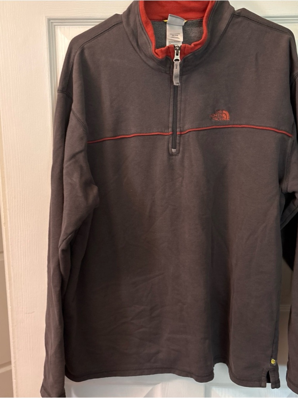 The North Face Black Pullover with Orange Logo Trim